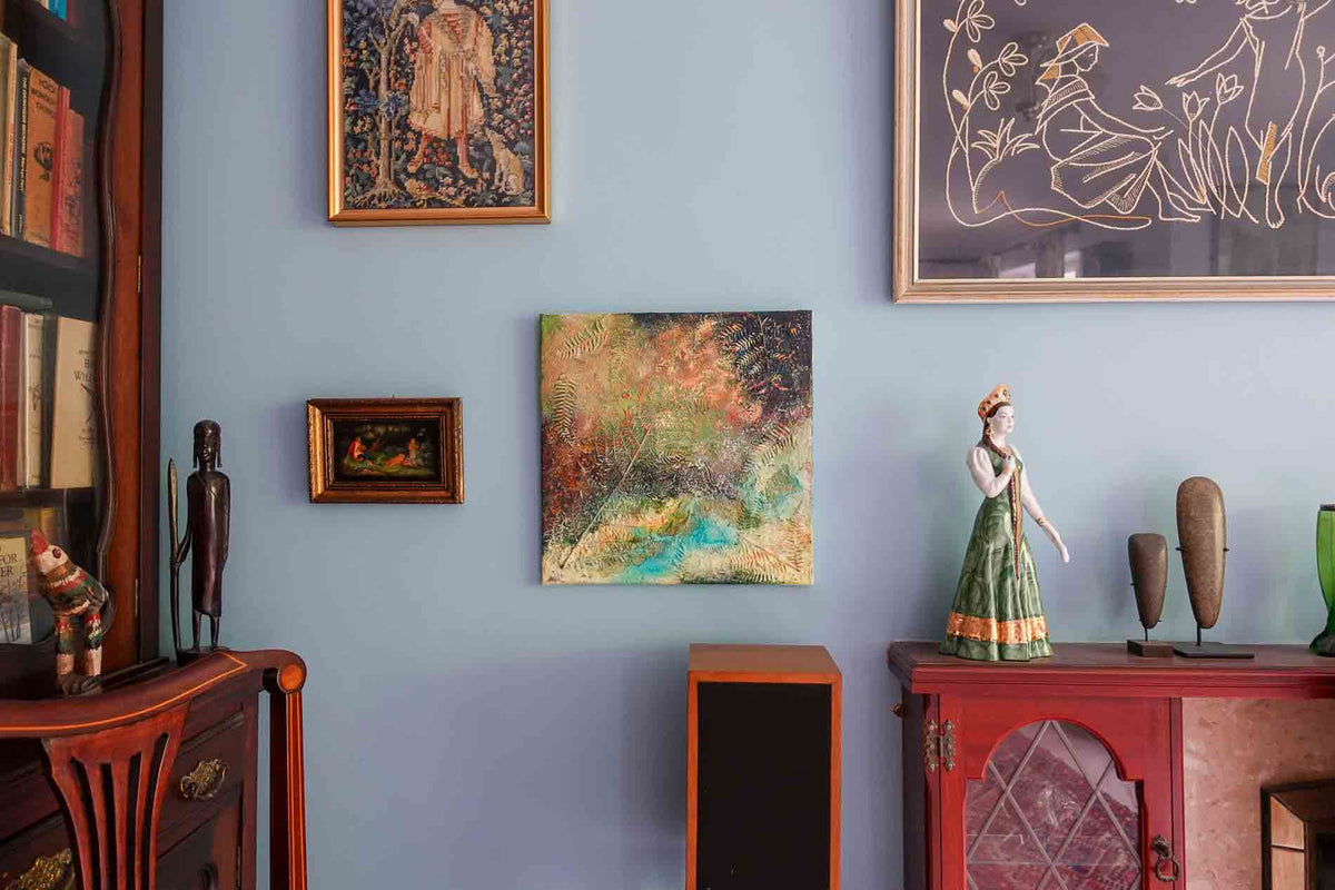 The Ethereal Autumn Stream, an abstract painting of water, plants and small fish, by Annette Price, in a collector's home.