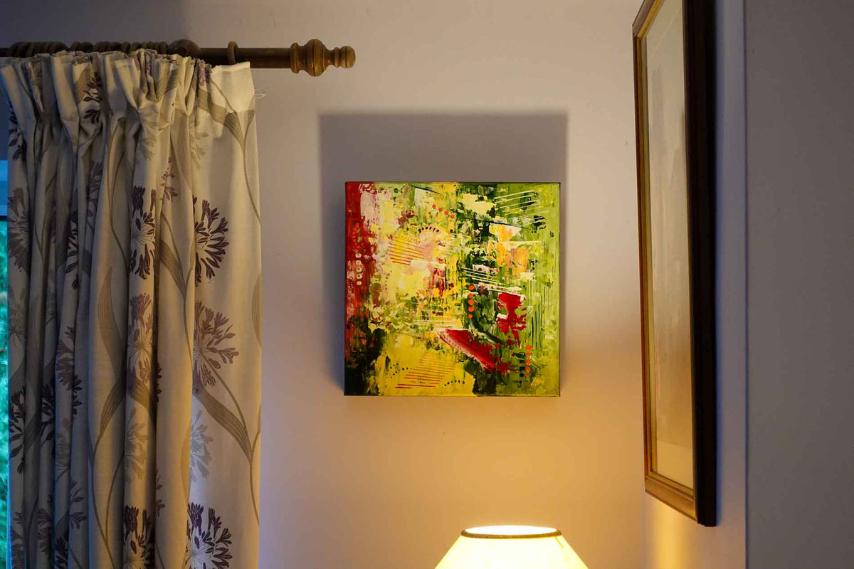 The Rambling Rose Garden, a textured abstract painting of an overgrown garden by Annette Price, hanging in a collector's London home